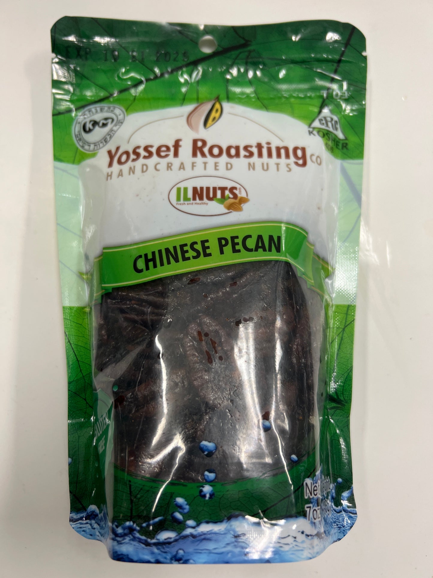 Yossef roasting Chinese pecan