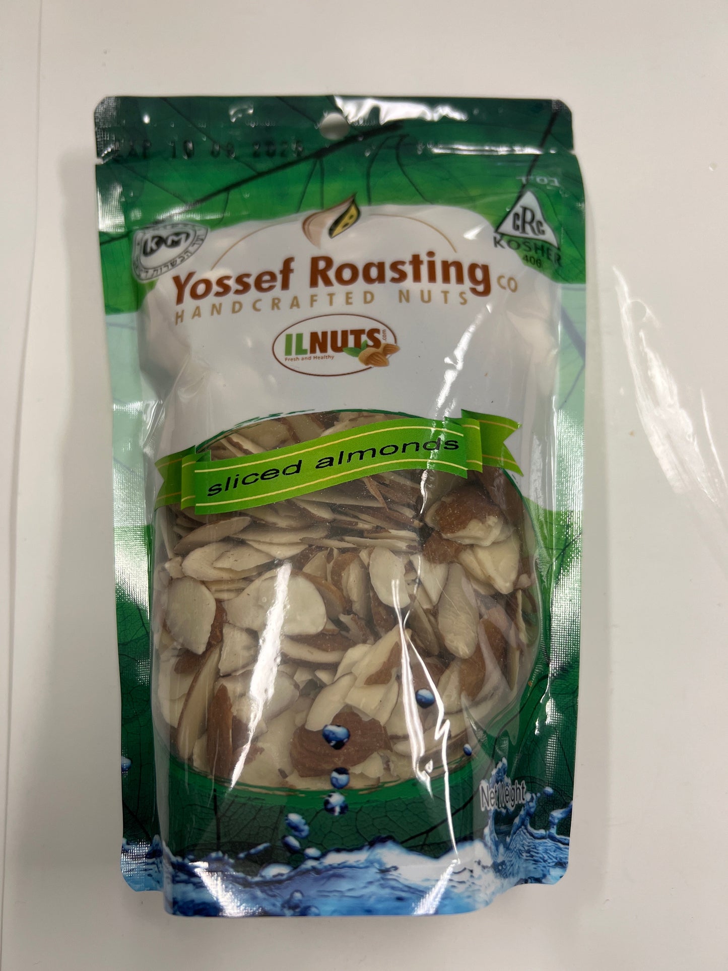 Yossef roasting sliced almonds