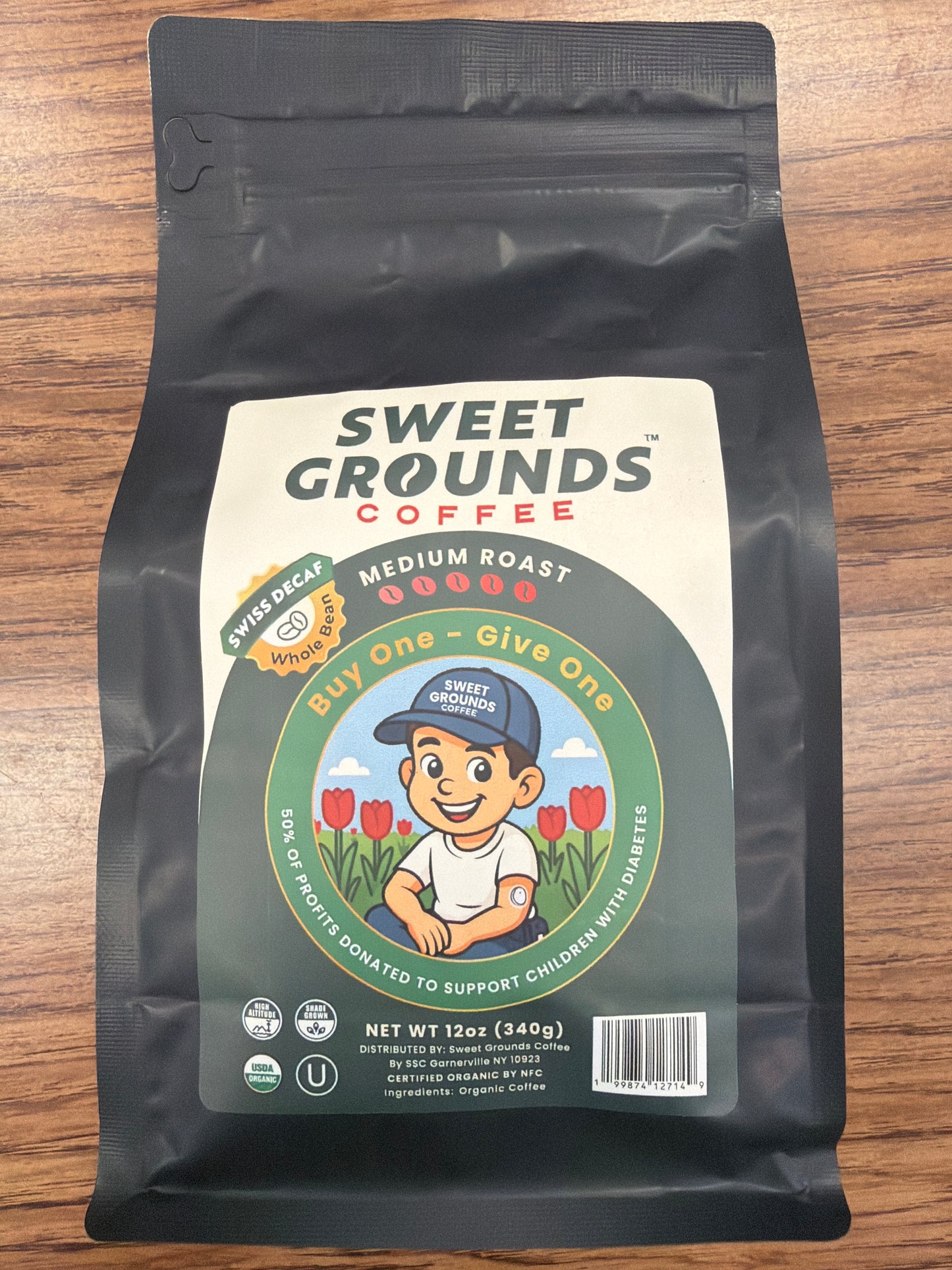 Sweet grounds coffee. Swiss decaf medium roast whole bean