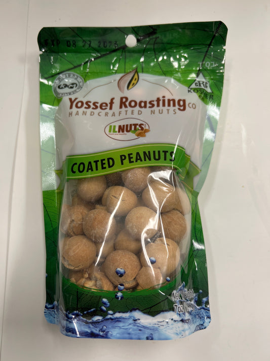 Yossef roasting coated peanuts