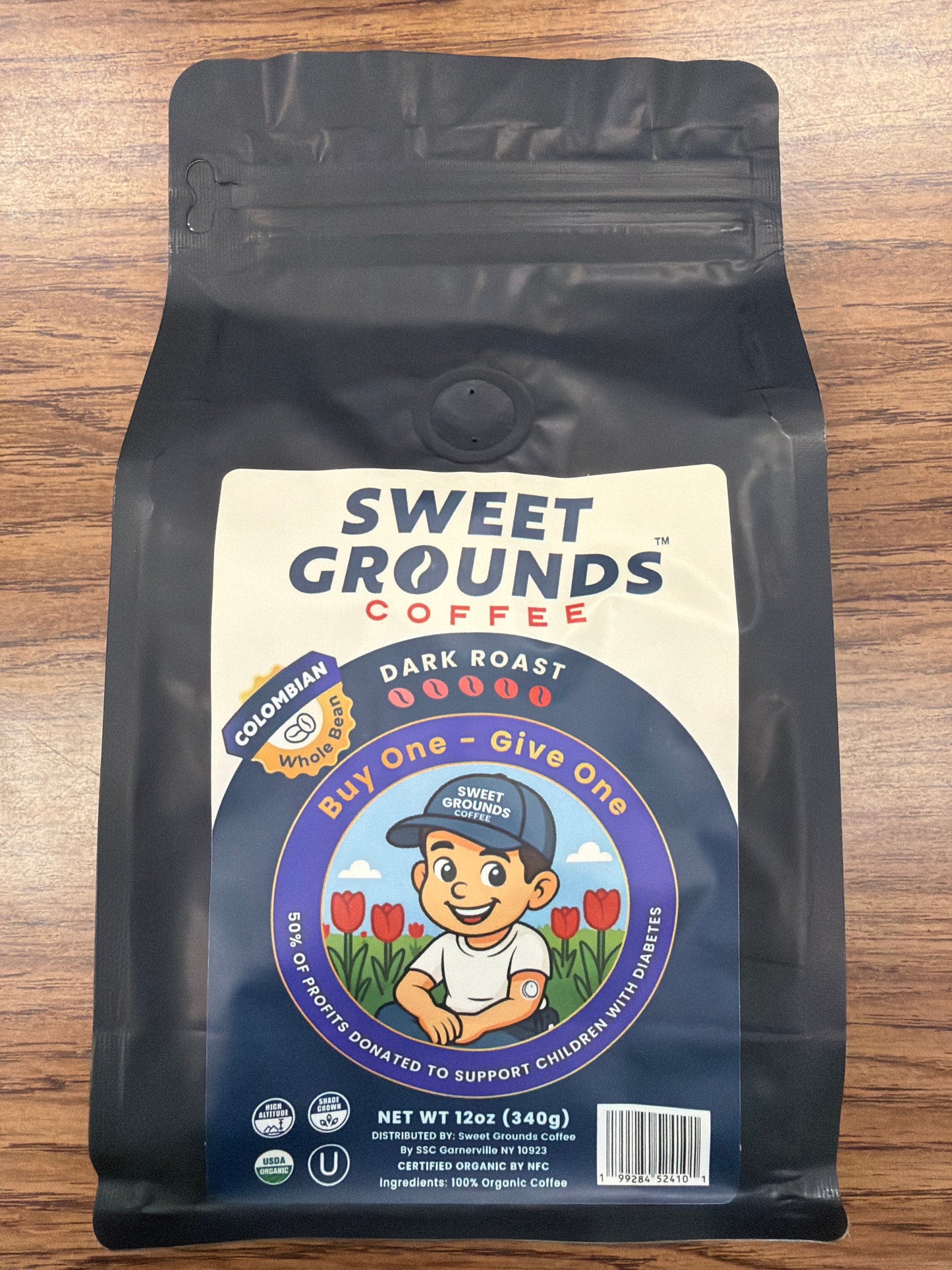 Sweet grounds coffee. Colombian dark roast whole bean