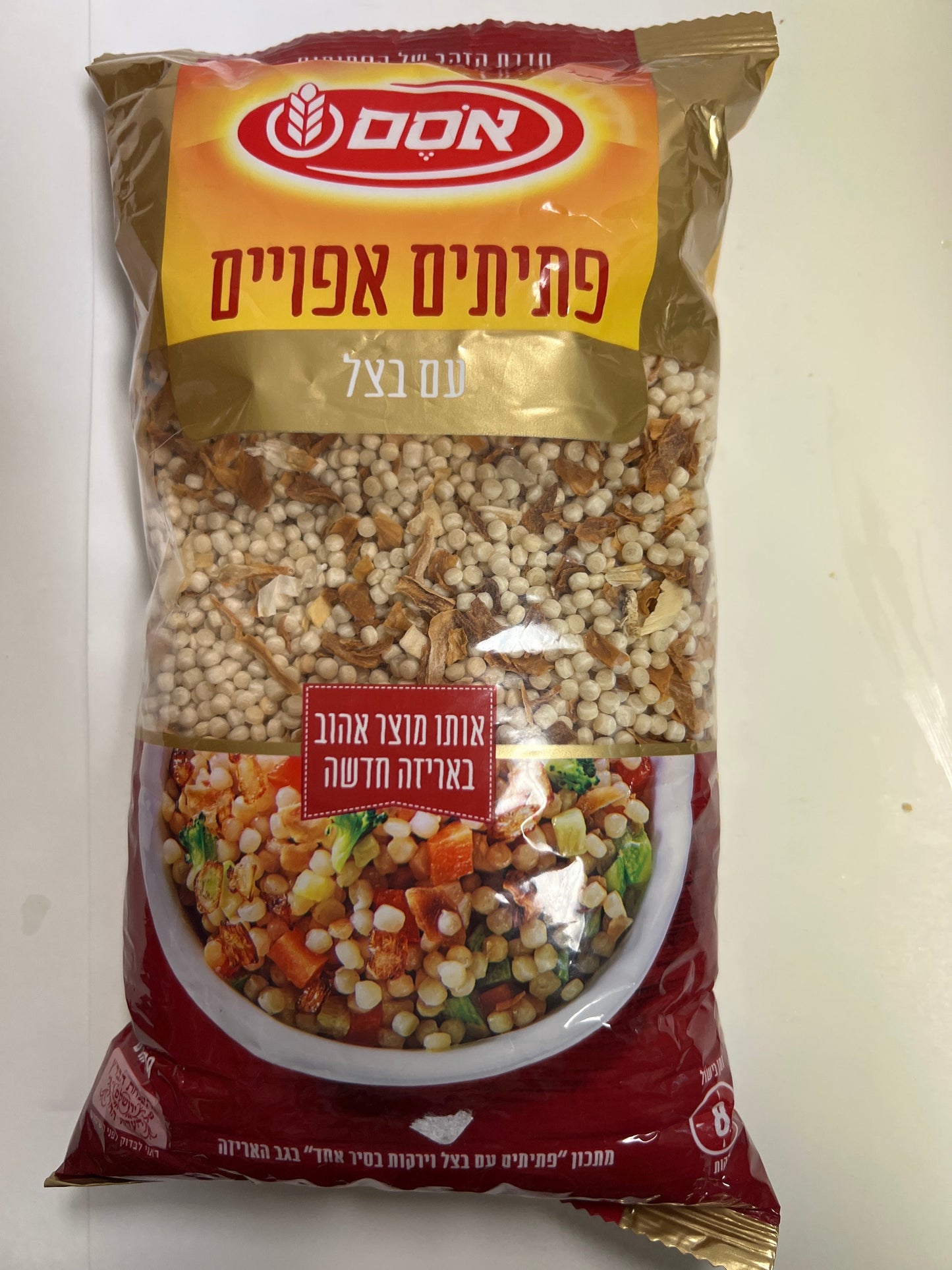 Osem baked pasta couscous and onion