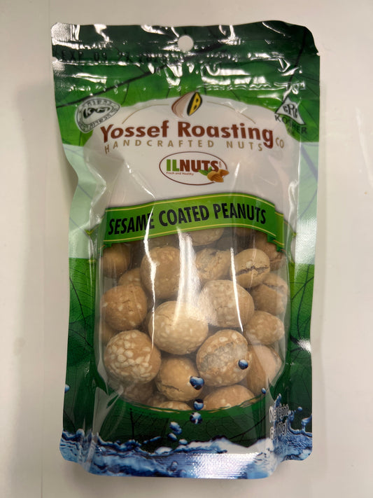 Yossef roasting sesame coated peanuts
