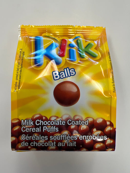 Klik balls. Milk chocolate coated cereal puffs￼